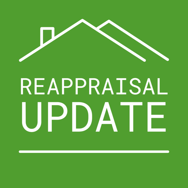 Green text graphic that says “Reappraisal Update” with an outline of a house